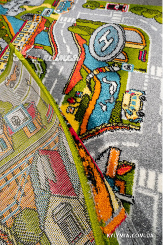KOLIBRI 11296 18798 Современные ковры на тканой основе, ворс средний - 9 мм, вес 2,2 кг/м2, нить - фризе. В детскую, гостиную и спальню. Сделаны в Украине  322х483