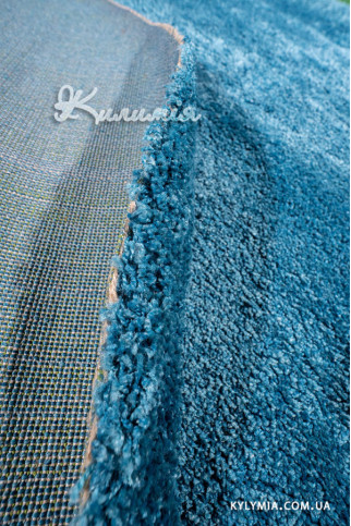 DELICATE blue 20947 Однотонні килими з помірно високим ворсом 20 мм, вага 3,2 кг/м2. У спальню, вітальню і дитячу 322х483