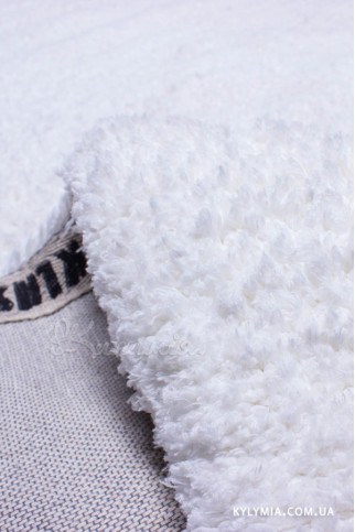 MICRO SHAG snow white 15453 Індійський килим з високим ворсом з поліестеру збереже тепло і затишок у вашому домі. 322х483